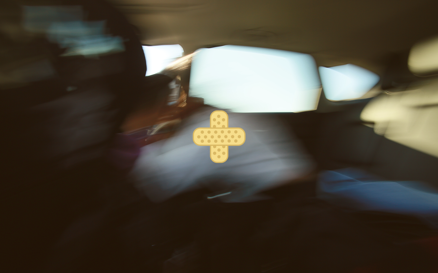 blurry image of simulated car passenger in back seat during a rideshare accident in NJ