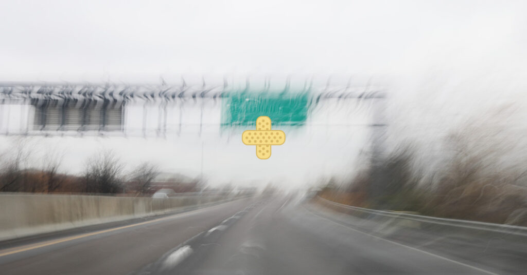 blurry image of NJ highway road sign simulating Uber drivers causing accidents in NJ
