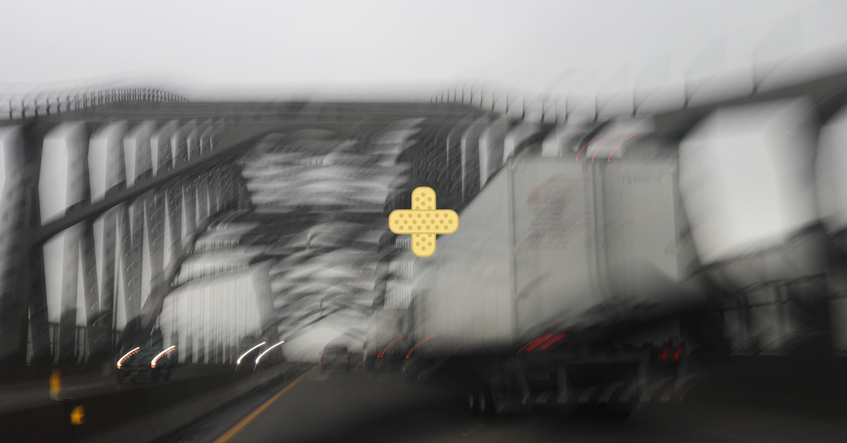 blurry image of NJ highway from inside of a car looking at bridge and 18-wheeler simulating a car accident